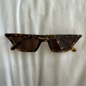 SOLD Contemporary small cat eye frame, never worn